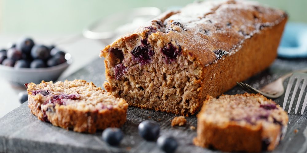 Tasty homemade sweet cake with berries on table. Closeup. Selective focus
